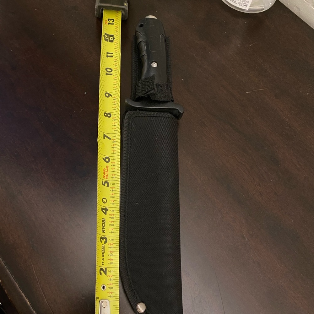 Sleek Black Knife with Sheath